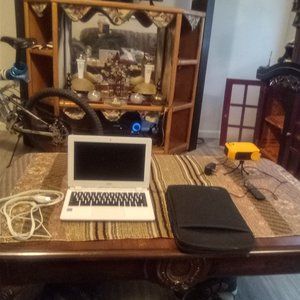 White Acer Chromebook laptop with case and projector that works with it with rem